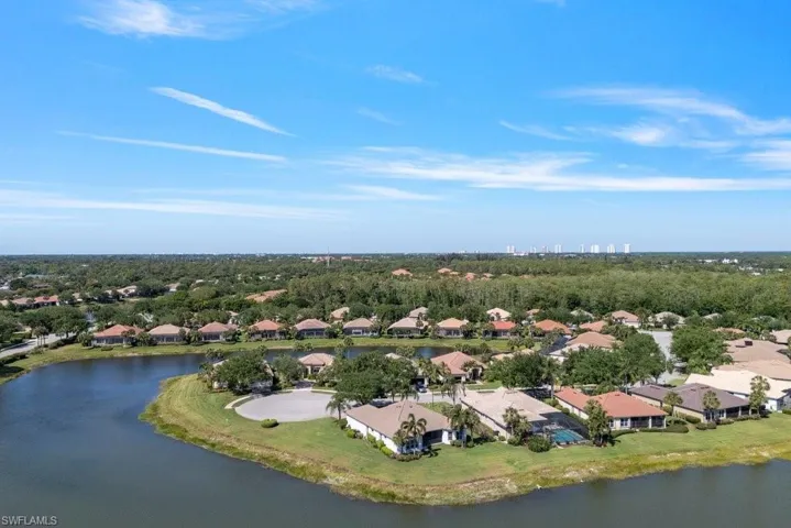 Bird's eye view featuring a water view and a residential view