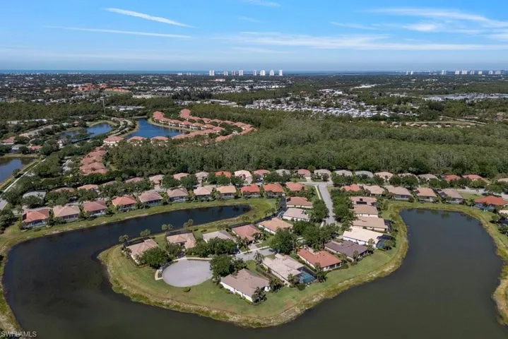 Aerial view with a residential view and a water view
