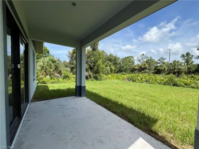 View of yard with a patio area
