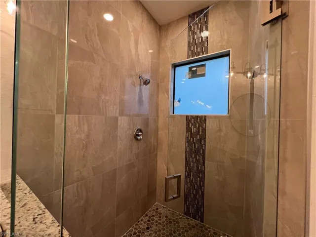 Bathroom featuring an enclosed shower