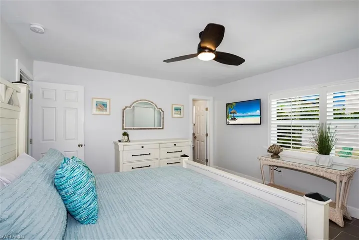Bedroom with a ceiling fan - Virtually Edited Image