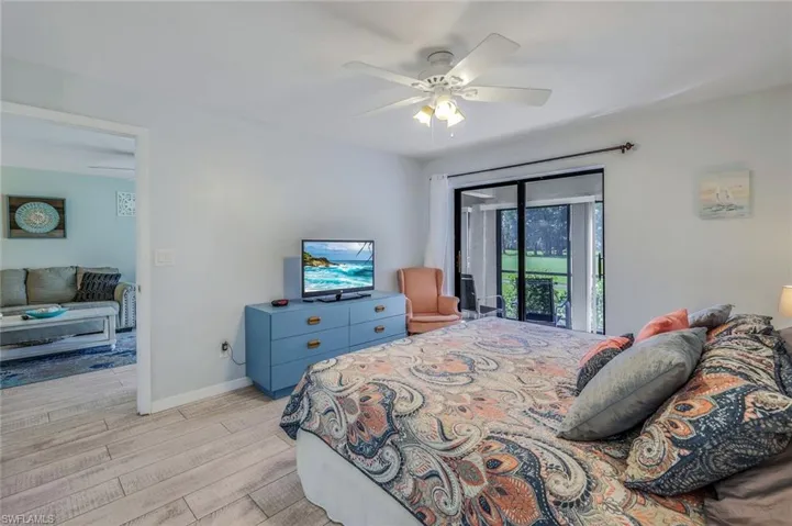 Light-toned wood-finish flooring throughout