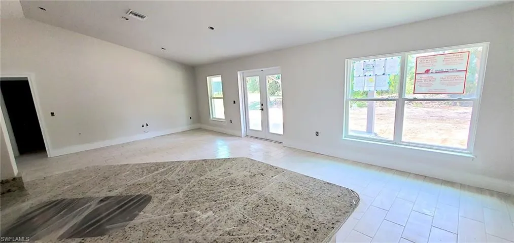 Empty room with french doors