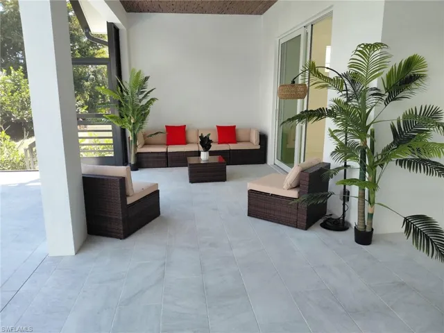 View of patio with an outdoor living space
