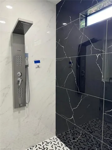 Bathroom with a tile shower