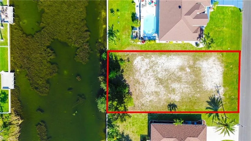 Aerial view of property's location featuring property parcel outlined