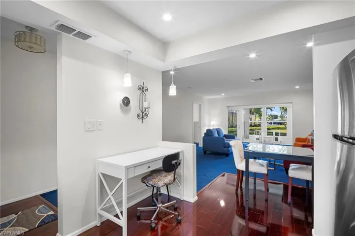 Office featuring recessed lighting, dark wood finished floors, and french doors
