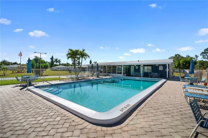 Community pool featuring a patio area