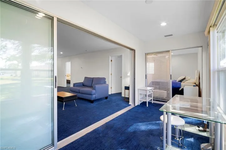 Carpeted office with recessed lighting