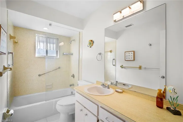 Full bathroom featuring bathtub / shower combination and vanity