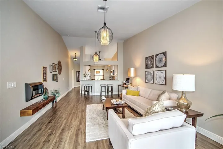 This condo is so airy and filled with natural light, featuring the impressive volume ceilings you only get in the 2nd-floor units. 1630 Sq ft under air and 2050 all-inclusive.