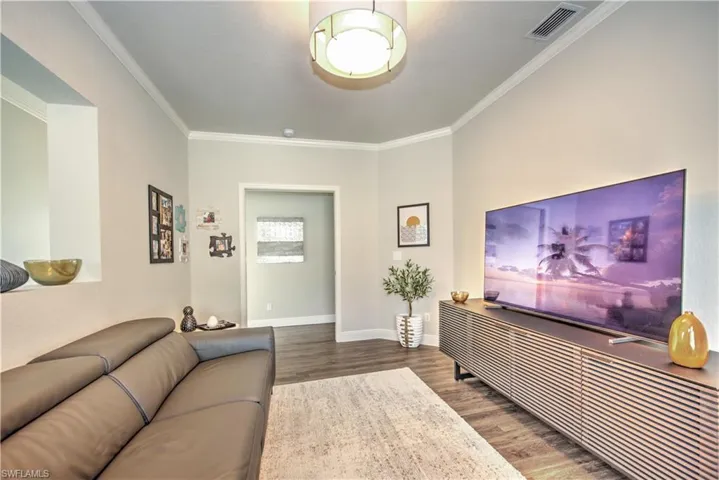 3rd bedroom Den/Media room features DBL sliding pocket doors for guest privacy