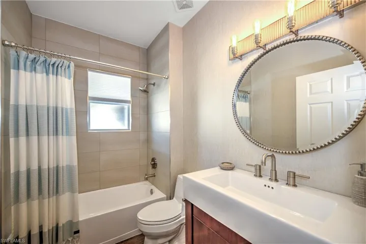 2nd guest bathroom, it's all nicely tucked away behind the potential of a private suite closure
