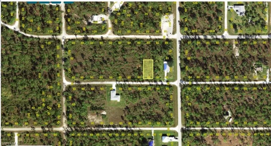 Aerial Plot Map. Displaying the property's boundaries and surrounding parcels with numerical identifiers