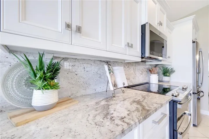 Beautiful granite counters and backsplash