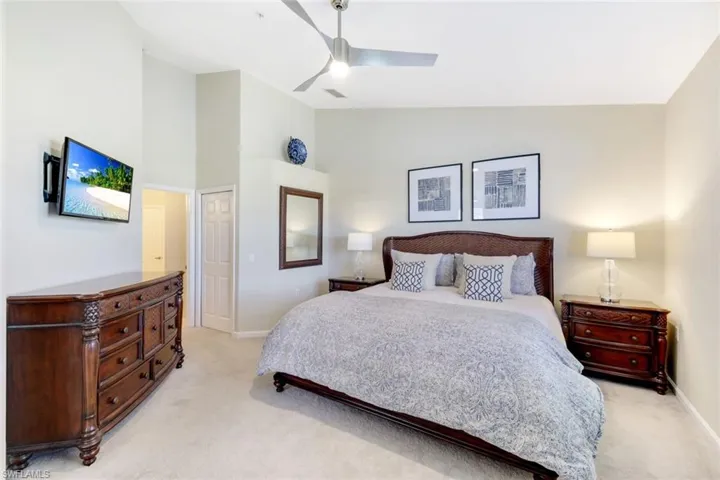 Large primary bedroom with lake views