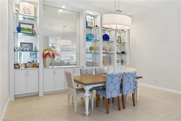Comfortable dining space with natural light and views toward the living area.