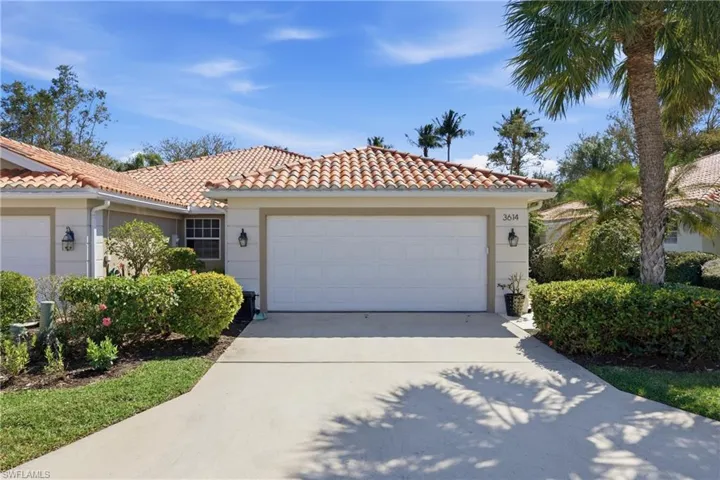 Front exterior of the Capri villa located on a quiet street in Village Walk.