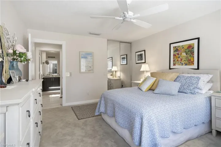 Relaxing primary suite featuring ample space and neutral finishes.