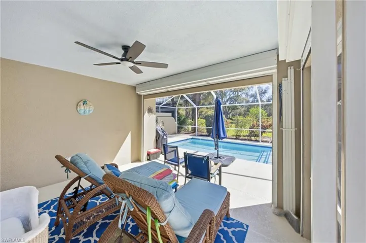 Solar heated pool offering a relaxing setting for enjoying the Naples sunshine year round.