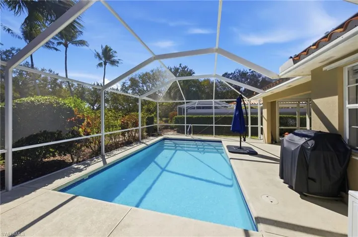 Pool area providing a tranquil outdoor setting for relaxation.