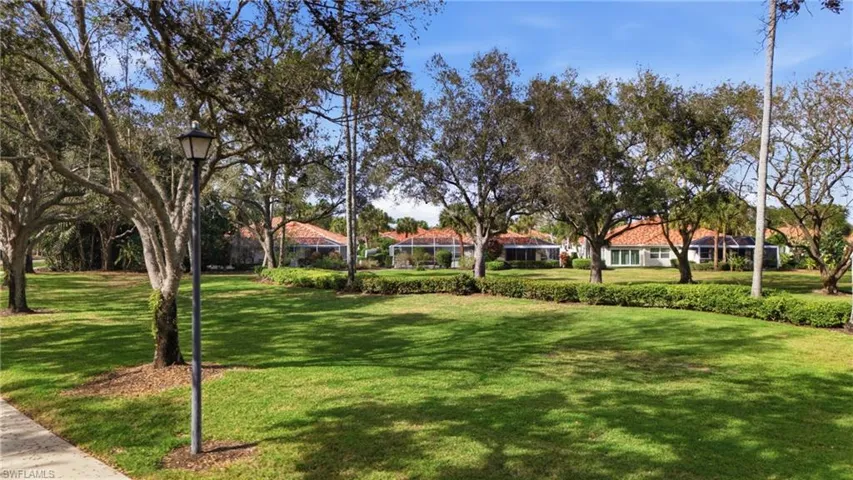 Serene yard area providing a relaxing backdrop for the home.