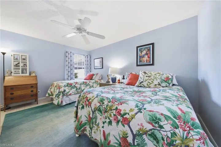 Guest bedroom with comfortable layout and natural light.