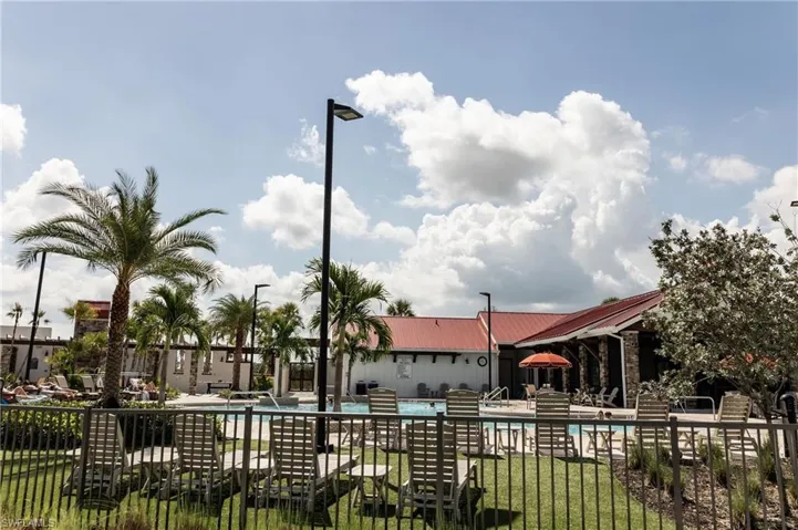Community pool with a patio area