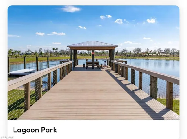 Dock with a water view and a gazebo