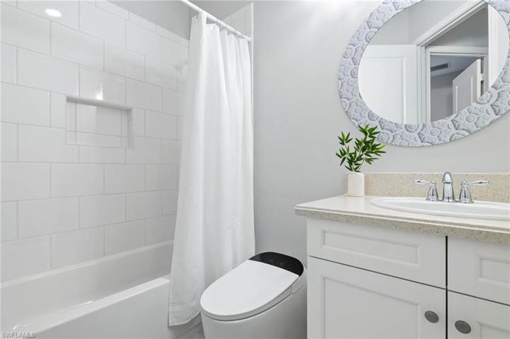 Guest bath with touchless Toto toilet