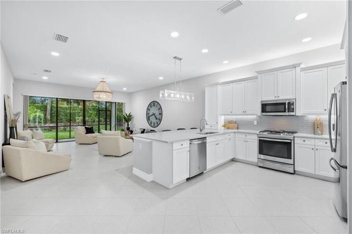 Open concept kitchen,  great room and lanai