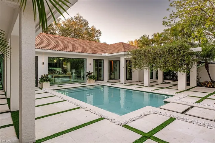 View of pool with a patio area