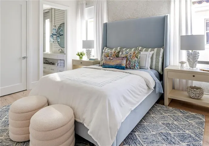 Bedroom featuring wood-type flooring