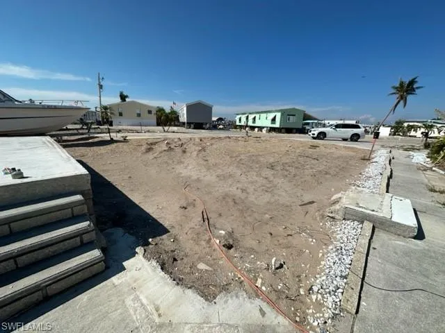 Concrete Lanai and walkway along property line still in place.