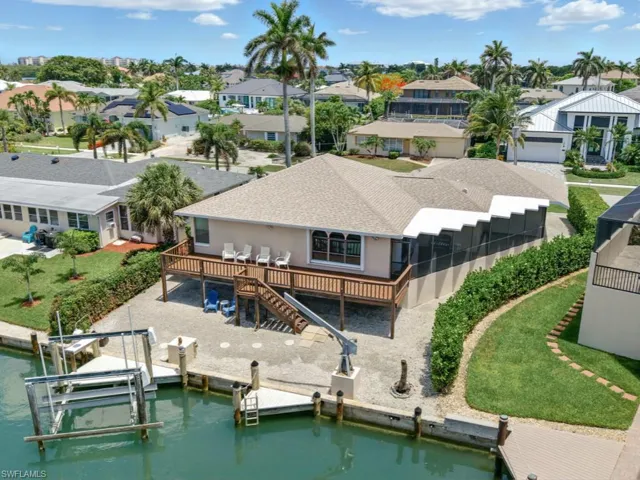 Enjoy a 12,000 lb boat lift and southwest exposure for great sunsets