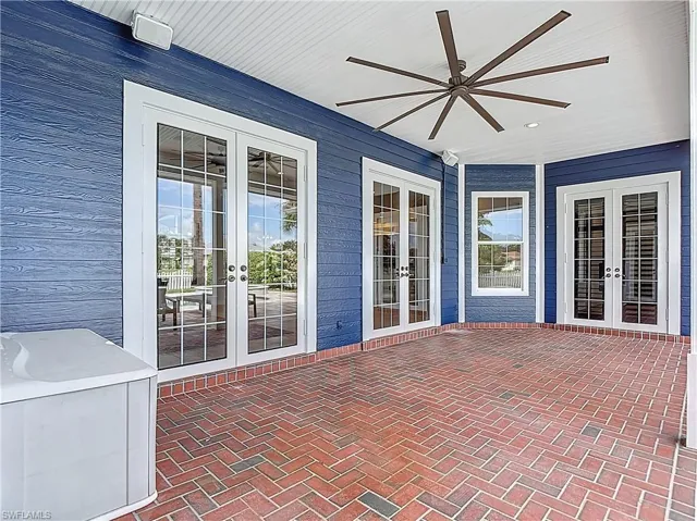 View of patio / terrace featuring french doors and ceiling fan