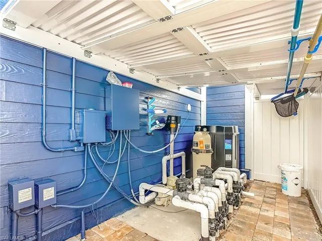 View of new pool equipment and enclosure.