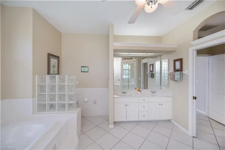 master bathroom with dual sinks