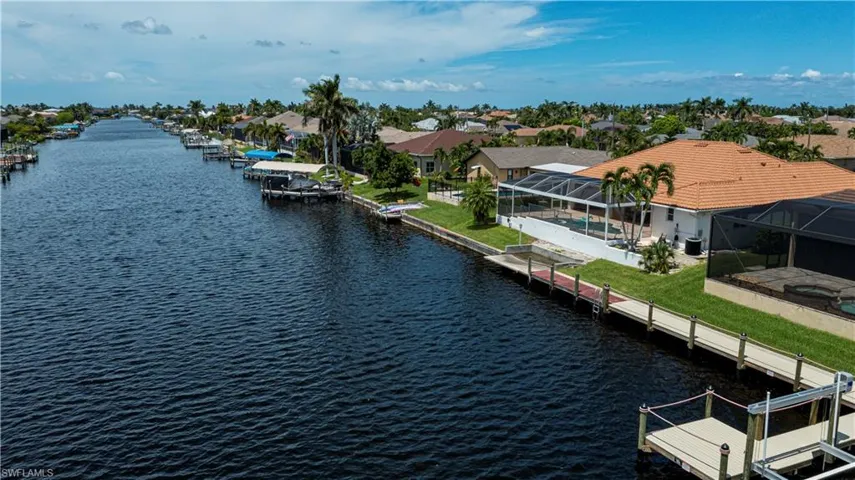 aerial of back of home a wide water view