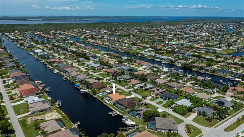 aerial view of the home and neighborhood from a different angle