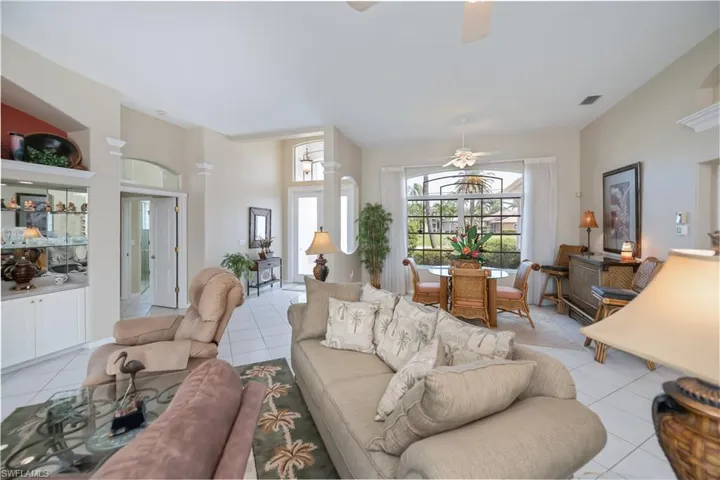 great room looking towards front door and dining room and entrance to the master suite