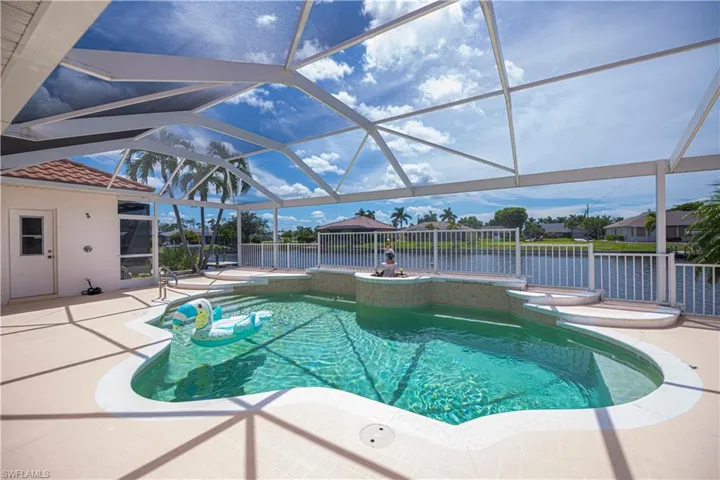 pool looking out to the wide canal and also entrance to the pool bath