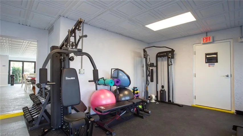 Gym with an ornate ceiling