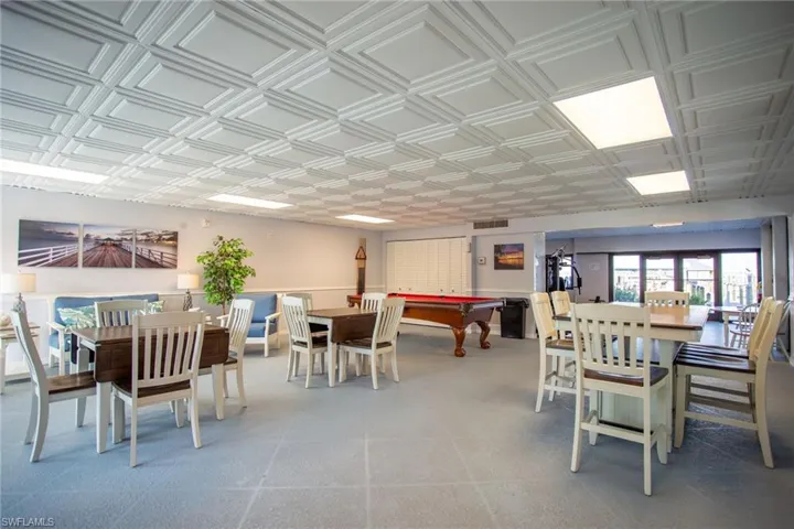 Dining room featuring an ornate ceiling and pool table
