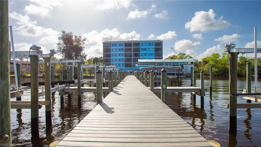 Dock with a water view and boat lift