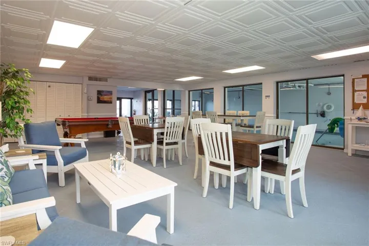 Dining area with an ornate ceiling and billiards