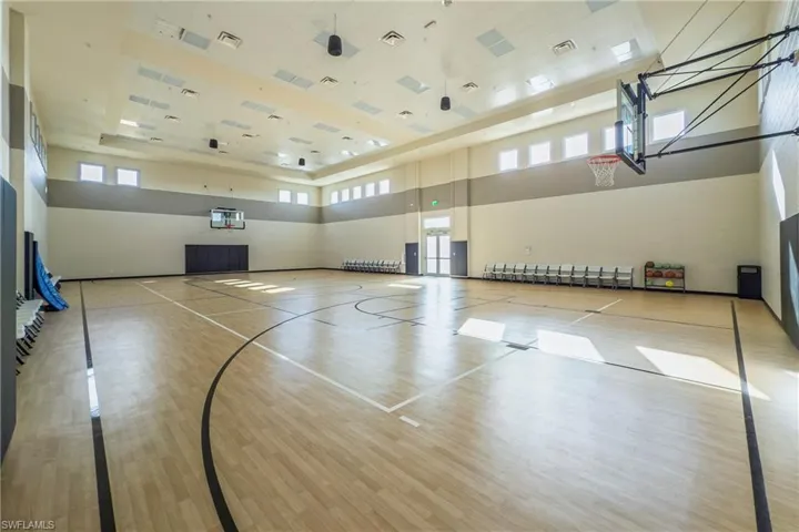 View of basketball court featuring a healthy amount of sunlight and community basketball court