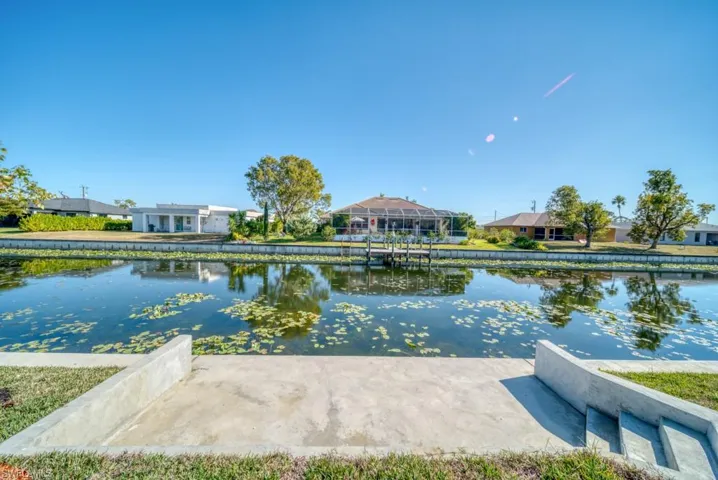 Water view with nearby suburban area