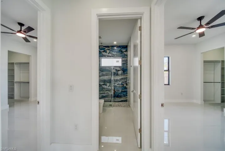 Hall featuring baseboards