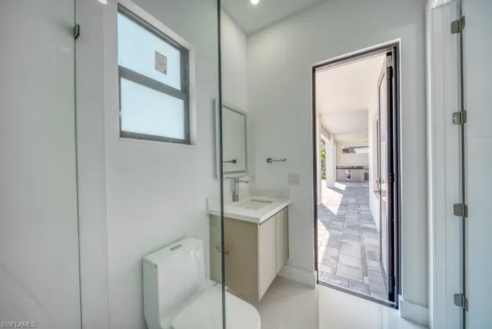 Half bath with vanity and toilet